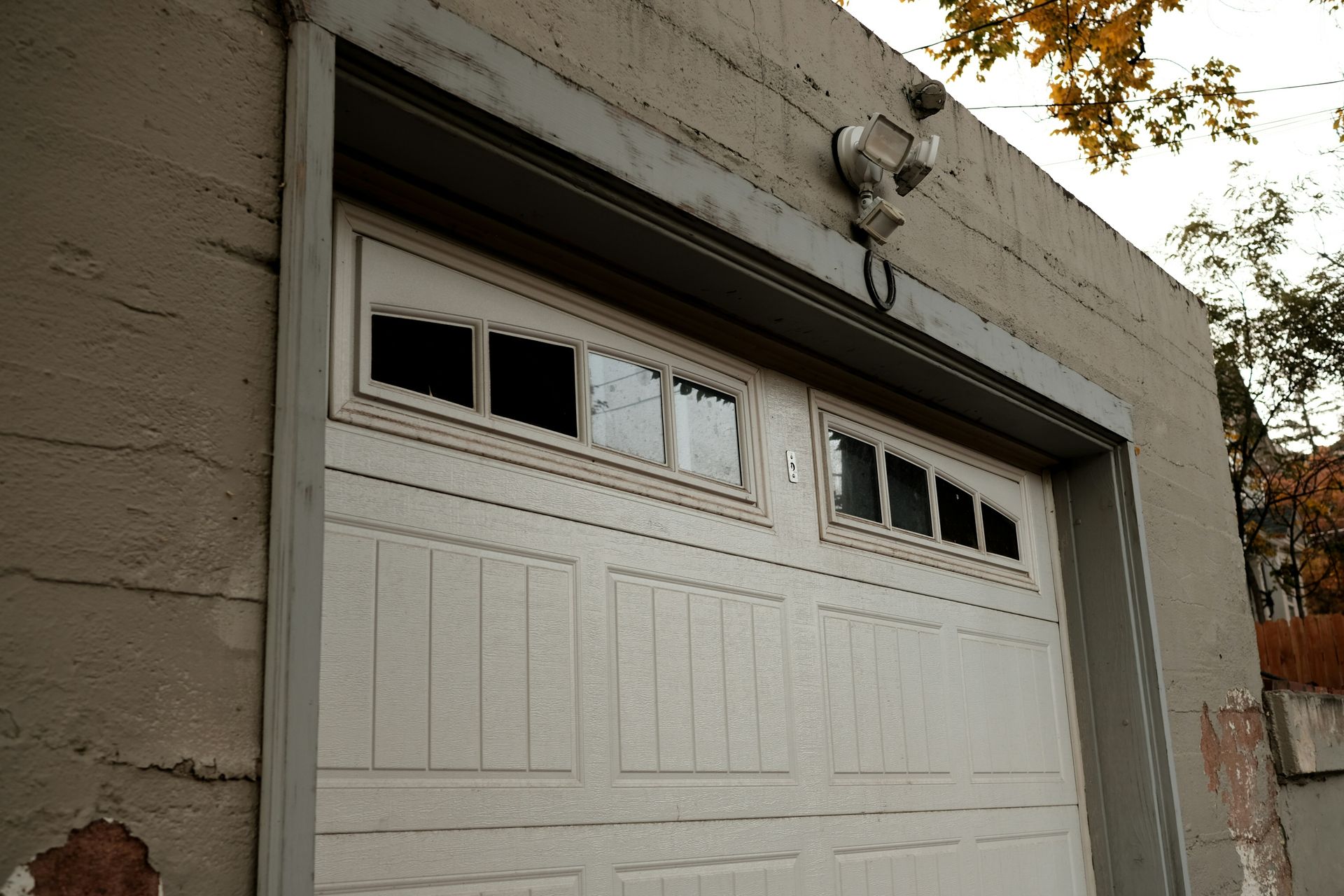 Residential garage door with overhead opener