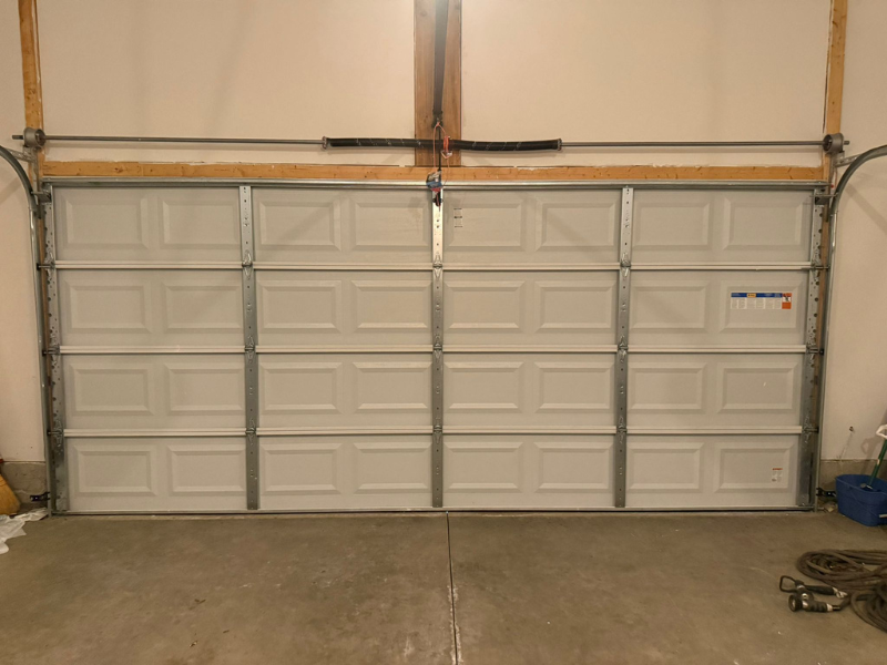 Freshly installed residential garage doors, the kind of fresh installation ProCare handles across Cleveland