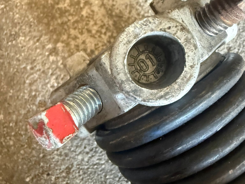 Severely corroded spring drum removed from a Cleveland garage door, an example of hardware worn past its service life